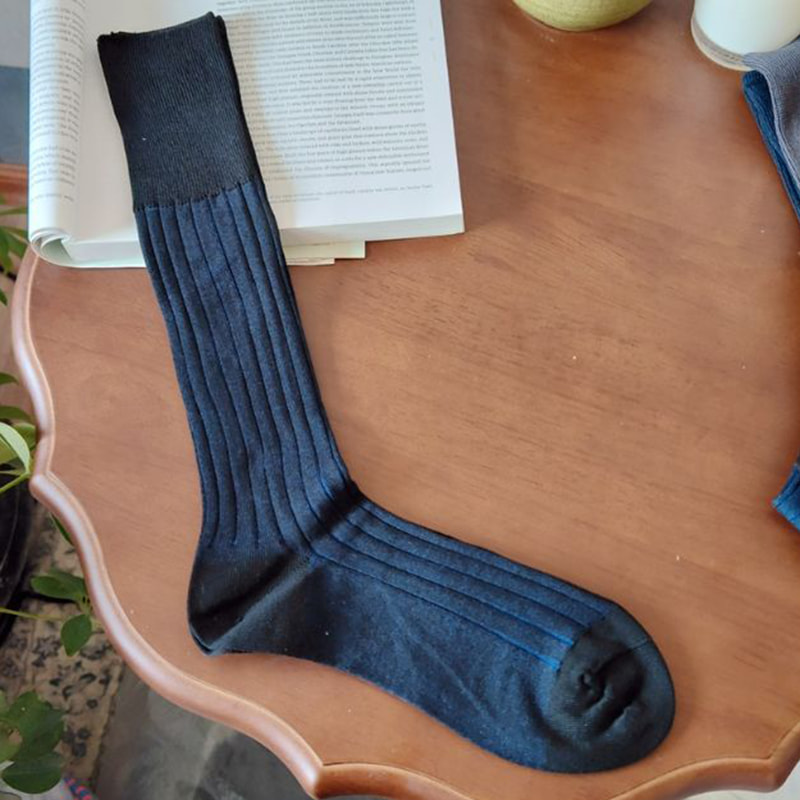 Kaksinkertainen neulan yritysjalkapallo -sukat Kaksinkertainen neulan yritysjalkapallo -sukat