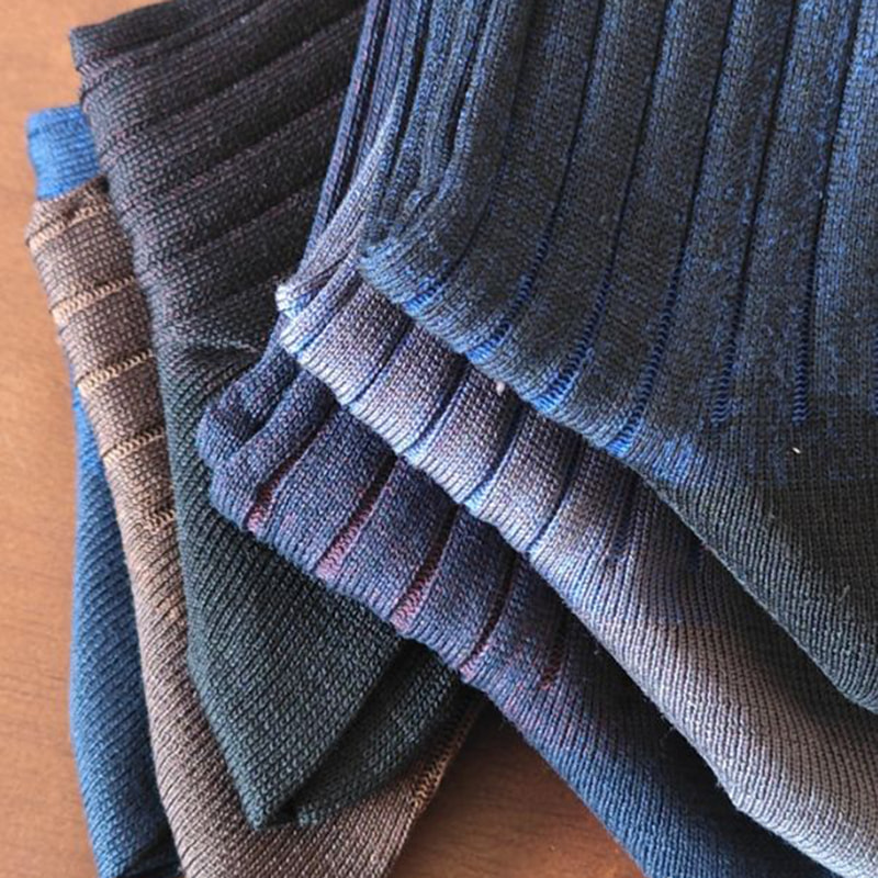 Kaksinkertainen neulan yritysjalkapallo -sukat Kaksinkertainen neulan yritysjalkapallo -sukat